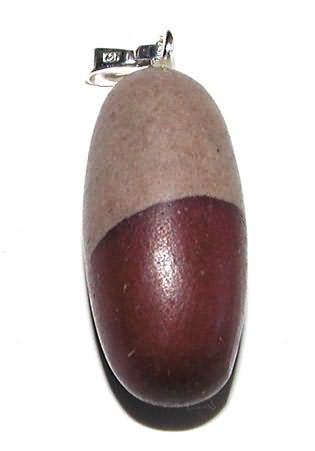Shiva-Lingam, Trommelstein